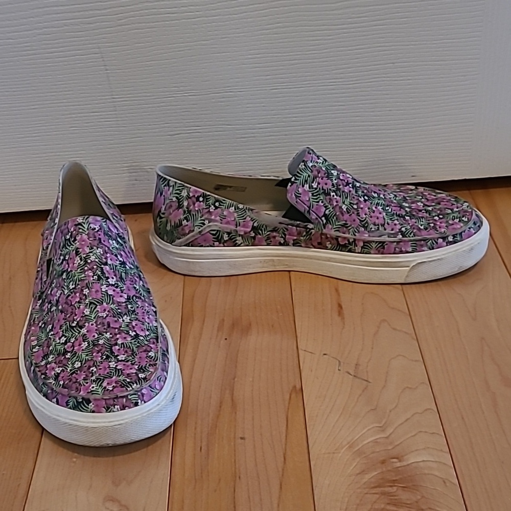 Women's size 8 (I believe) colorful slip on Crocs shoes
